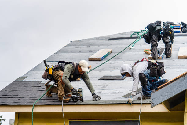 Professional Gutter Installation technician working in Melville, RI